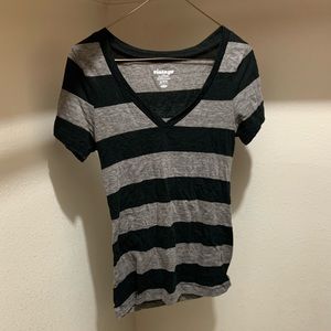 Black and gray stripped shirt.